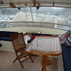 Fly bridge looking aft, tender just outside with davit.