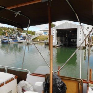 Vertical "anvil" in place to back the hammering from setting grommets to the bimini.