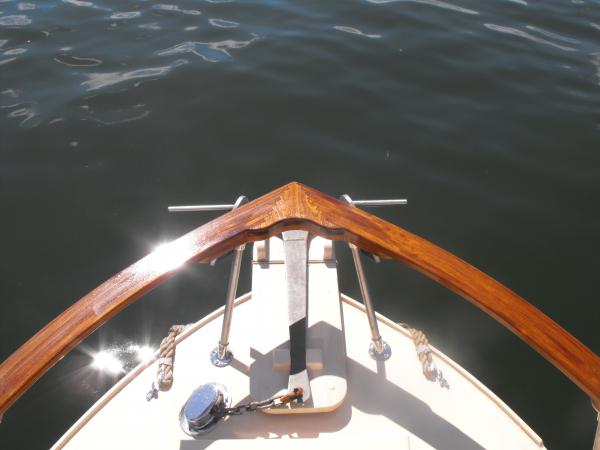 Laminated teak bow rail