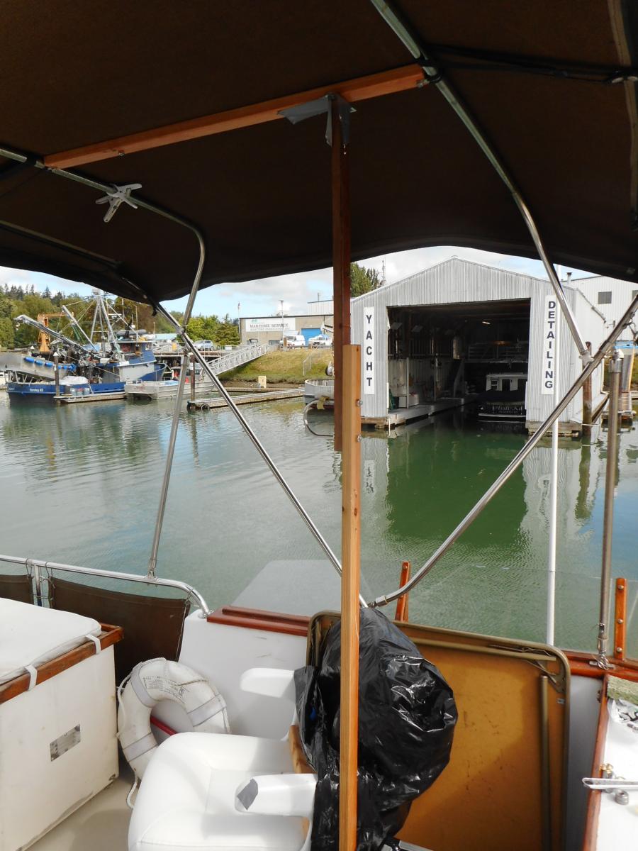 Vertical "anvil" in place to back the hammering from setting grommets to the bimini.